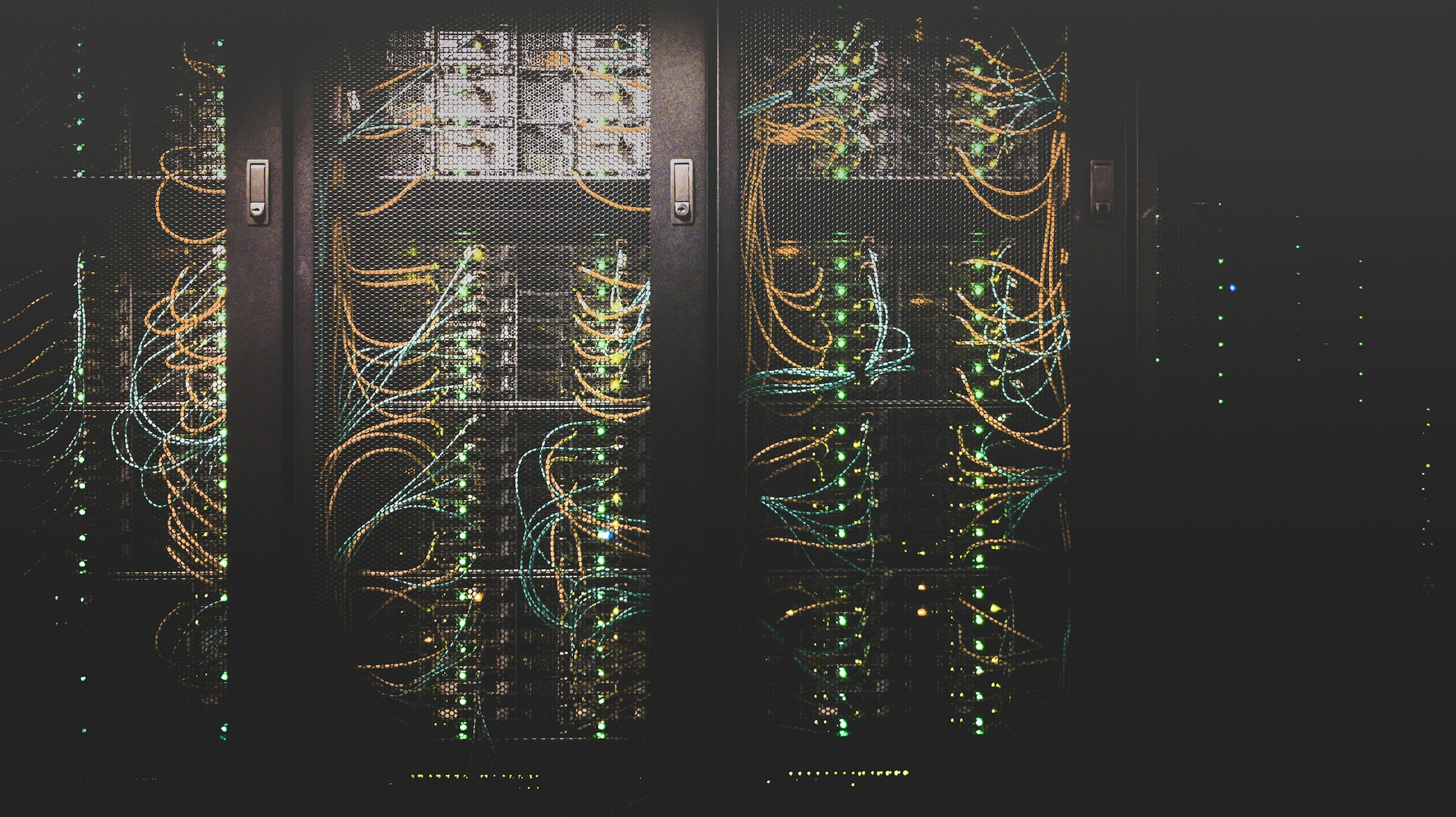 Support engineers monitoring dashboards in a network operations centre